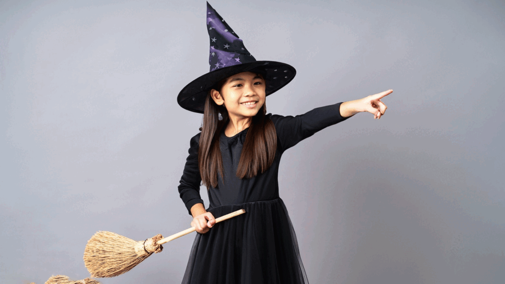 Cute Girl wearing Fairy Tale Witch Costume